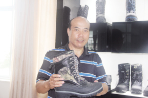 李雪飆:一雙“鞋”行走天下